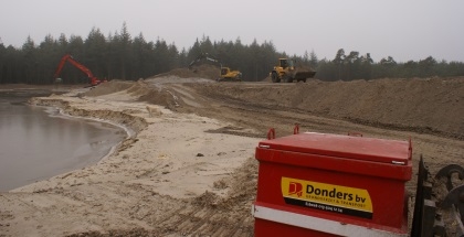 Afgraven blusvijver met aandacht voor natuur 